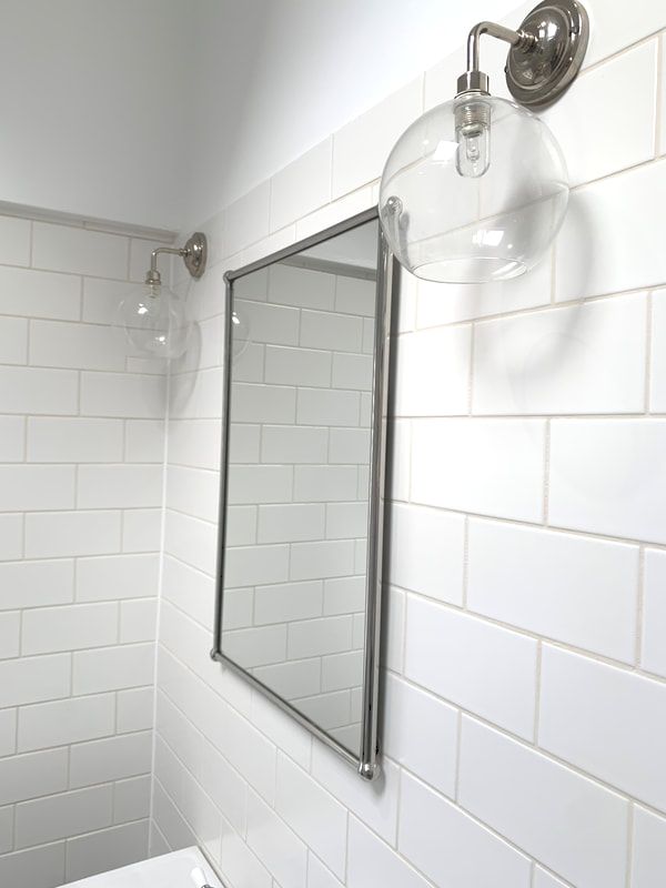 modern bathroom mirror with traditional lights. Clean and bright Picture